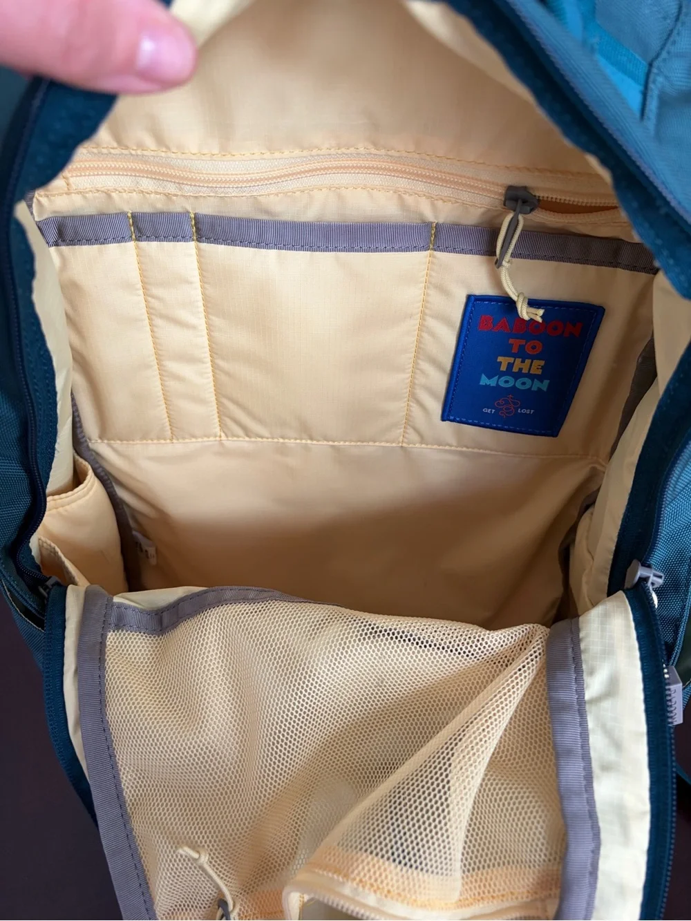 Baboon to the moon city backpack in teal with yellow